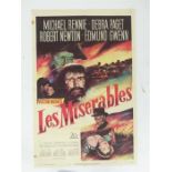 A film poster for Les Miserables featuring Michael Rennie, Deborah Padgett and Robert Newton; folded