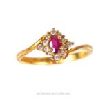 An 18 ct yellow gold diamond and ruby cluster ring