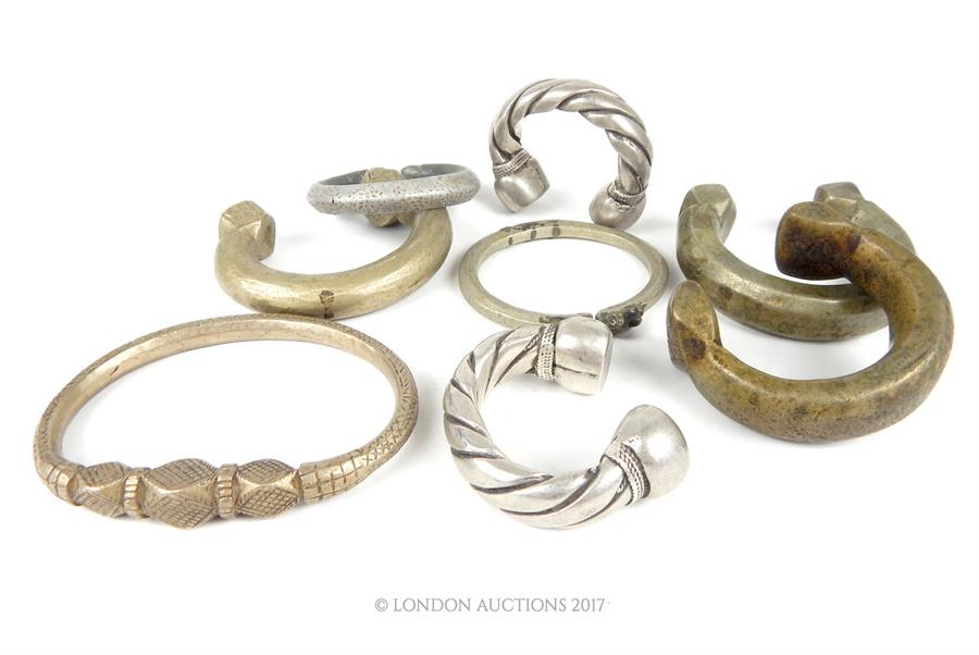 A selection of Bedouin white metal jewellery, comprising; two large rings mounted with intaglio - Image 2 of 5