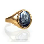 9ct gold intaglio carved hematite ring