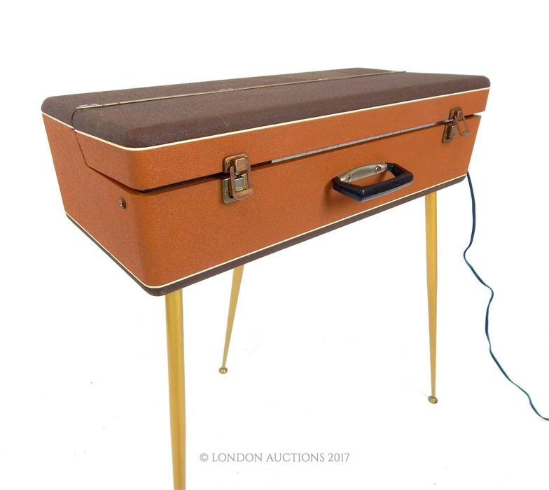 A vintage 1960's Companion Sheltone travel organ / piano, the case covered in brown rexine - Image 3 of 3