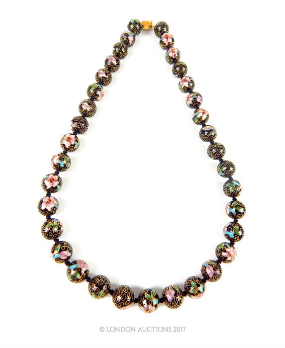 A Chinese Cloisonne bead necklace, with gilt metal clasp 60 cm long