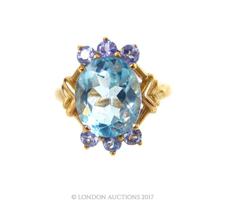 A 9ct blue topaz and tanzanite cocktail ring