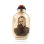 A snuff bottle with image of Chinese gentleman; 8cm high.