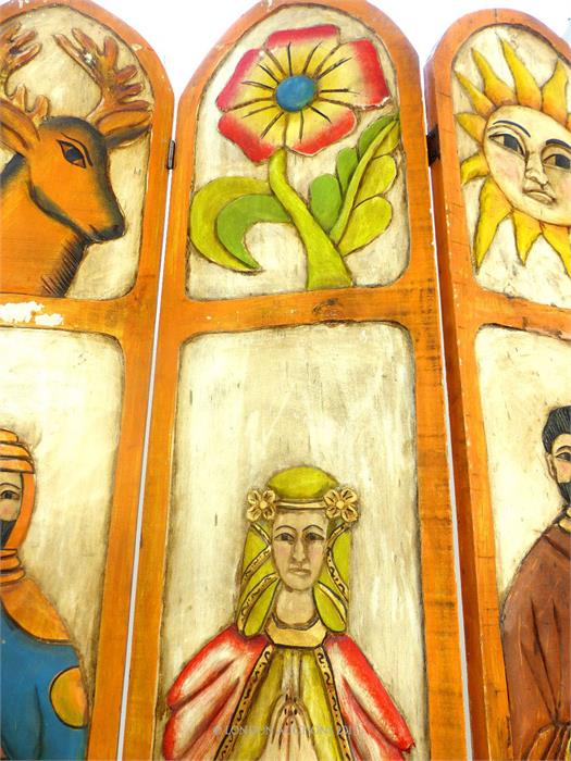 A brightly painted carved Mexican teak four fold screen, with arched top, carved with animals and - Image 2 of 5