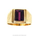 Gents 18 ct gold ring set with a step cut garnet, marked 750, Size X