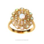 A 9ct gold opal Art Deco design plaque ring