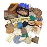 A large collection of vintage ladies evening and handbags, to include some with celluloid frames,