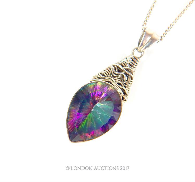 A sterling silver and mystic topaz pendant and chain