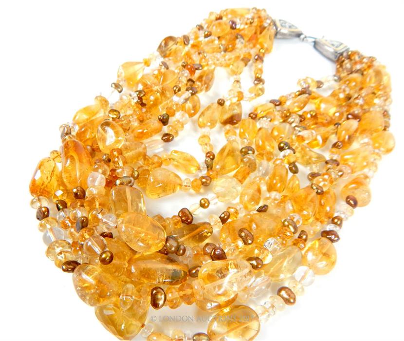 An eight strand honey coloured quartz and pearl necklace, with silver clasp, 48 cm long - Image 3 of 3