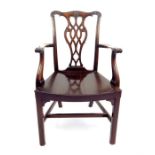 A Chippendale style mahogany open armchair, having a pierced splat back