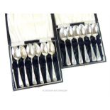 A set of twelve Victorian hallmarked sterling silver tea spoons in two cases