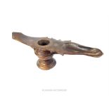 An eastern bronze oil lamp;