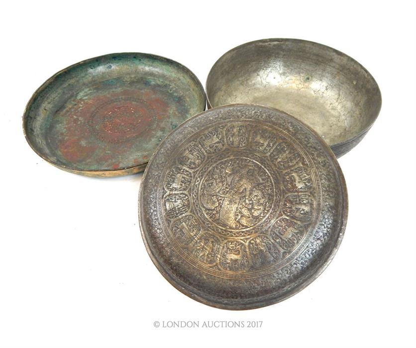 A large, Eastern, hand-beaten, circular copper dish with a stamped star motif decoration to the bowl - Image 2 of 2