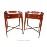 A pair of Georgian style mahogany bedside tables, with shaped 3/4 gallery over a single drawer