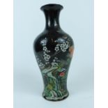 A Chinese famille noire baluster form vase