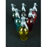 A harlequin set of six coloured glass artisan soda syphons