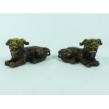 Pair of Chinese bronzed metal recumbent Fo dogs, 13.5 cm long