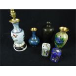 A collection of six Chinese cloisonne items, including a lamp on a carved wooden stand