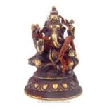 A bronzed metal figurine of Ganesha; 10cm high.