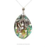 A silver mounted abalone shell inset with pearls