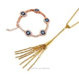 A gold plated tassel necklace by Givenchy and silver gilt bracelet