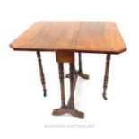 An Edwardian rosewood Sutherland table with Sheraton style inlay,