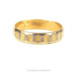 A 9 ct yellow gold band