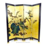 A Japanese black lacquered and gilt four fold screen