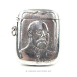 A sterling silver vesta case featuring the relief image of King George V.