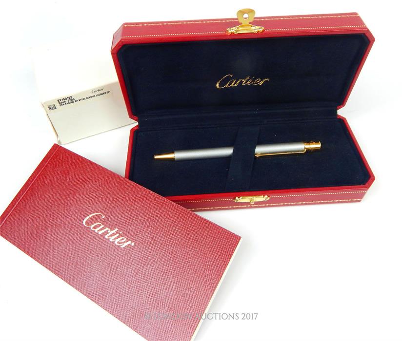 A fine, boxed, Cartier, gold plated ballpoint pen