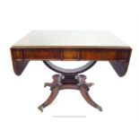 A Georgian rosewood sofa table; with bowed support fitting to is base; 143cm wide (fully