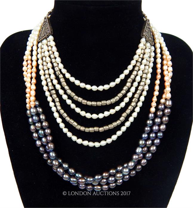 A pair of elegant, freshwater pearl necklaces with sterling silver fittings