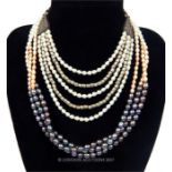 A pair of elegant, freshwater pearl necklaces with sterling silver fittings