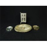 A silver fronted and black leather bible (12.2 x 8 x 3 cm), two sterling silver, circular dishes