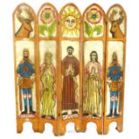 A brightly painted carved Mexican teak four fold screen, with arched top, carved with animals and