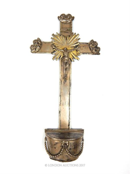 An early 20th century, French, silver plated crucifix and church wafer container