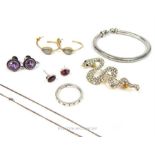 A collection of silver jewellery items and others