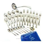 A collection of EP flatware including ladle, forks and spoons.