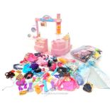 A quantity of Sindy and other similar doll accessories:dressing table set, clothing etc.