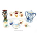 A collection of pottery tygs, including a Royal Bonn Delft tyg having pictorial reserves