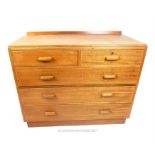 A Heals style maple topped chest of drawers; 106cm wide.