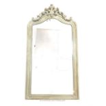 An antique French style wall mirror with a grey painted and distressed frame