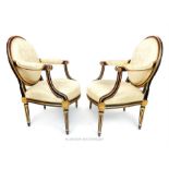 A pair of antique, period, Louis XVI French fauteils, upholstered in ivory damask
