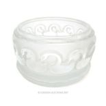 A Lalique style jar decorated with swans, signed "Lalique France"; without lid; 9.5cm diameter.