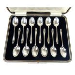 A cased set of Art Deco sterling silver tea spoons