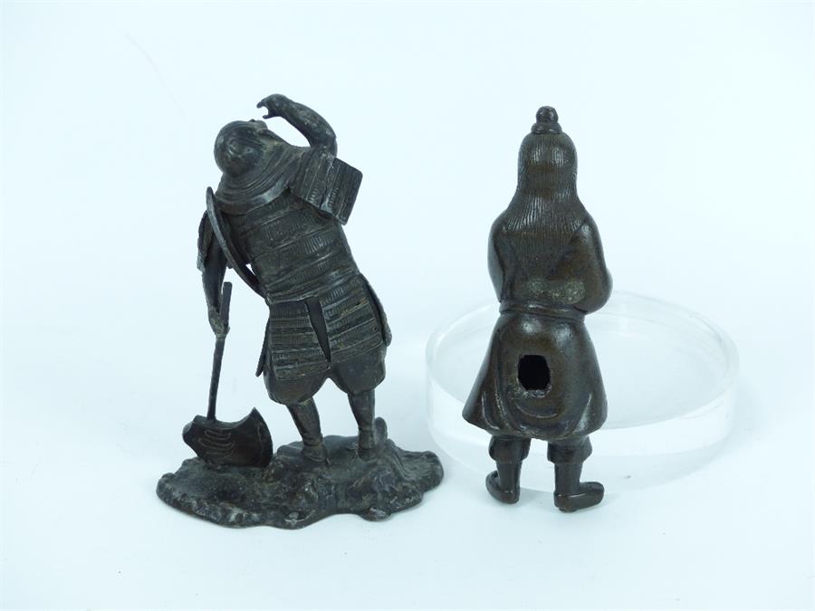 A Japanese bronzed spelter figure of a samurai warrior holding an axe and staring into the distance, - Image 3 of 3