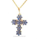 14 ct yellow gold blue topaz cross pendant