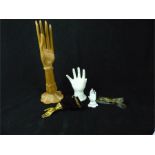 A collection of vintage decorative hands/ ring holders