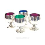 A set of four American silver and enamel liqueur cups